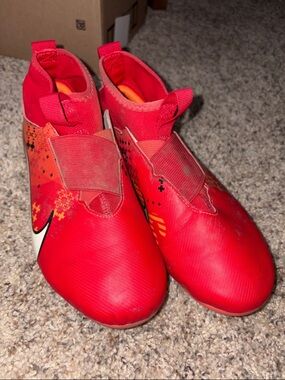 Nike Red Kids Soccer Cleats with White Swoosh